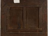an old wooden picture frame with a window and a tag on it