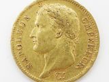 an image of a gold coin with a woman ' s face on it