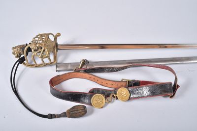 an image of a sword and other items on a white surface