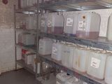 many containers and containers on the shelves in the room