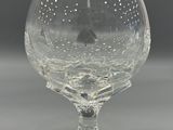 a glass that is sitting on top of a table
