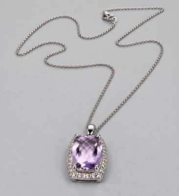 an amethorate and diamond pendant on a chain