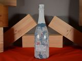 a bottle of wine that is sitting on a table