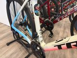 a bike that is sitting on a stand in a room