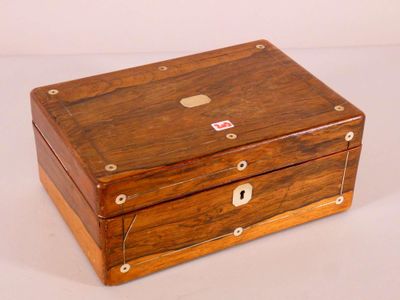 a small wooden box with a lock on it