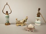 three different pieces of porcelain on the table