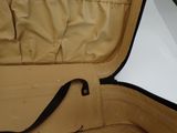 a piece of luggage that is open on the floor