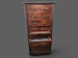 an old wooden chest of drawers with a drawer underneath it