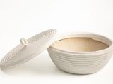 bowl with lid made of white clay with a lid on top