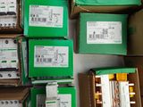 several boxes of electronic devices are stacked on top of each other