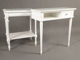two white tables with drawers and a shelf on top of them
