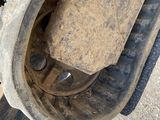 a close up of a tire on a dirt bike