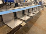 an image of a conveyor belt in a factory with a conveyor belt in the foreground