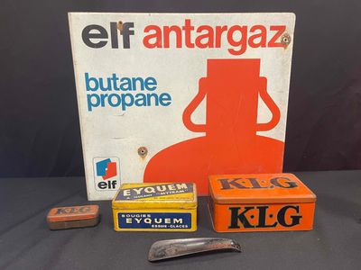 a box of cigarettes and a box of cigarettes on a table