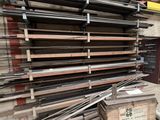 a large pile of metal and wood in a warehouse