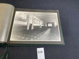 an old photo of a large room with chairs and pictures on the wall