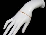 bracelet on a mannequin hand on a black background