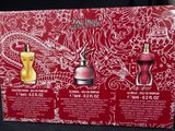a close up of a box of perfumes on a table