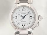 a close up of a wrist watch with a white dial