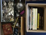 a box full of silverware and other silverware items