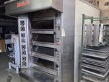 a large oven that is sitting in the middle of a room