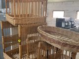 many baskets that are stacked on top of each other
