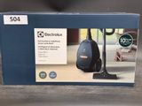 an image of a box with a vacuum on it on a table