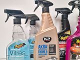 several different types of cleaning products are lined up on a shelf