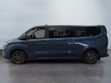 the blue van is parked in a room with a white wall