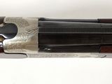 an old shotgun with a wooden body and a metal handle