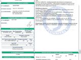 un document vert et blanc sur lequel figure un code-barres