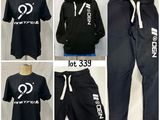 men ' s black hoodie and sweatpants set with white logo