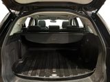 the back of a car with the trunk open showing the cargo area