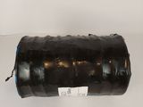 a roll of black plastic material on a white surface