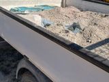 a truck that is parked on the side of the road