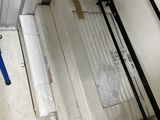 a mattress that is sitting in the corner of a room