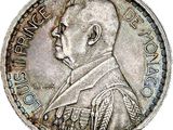 Gros plan sur une pièce de monnaie portant le visage d'un homme
