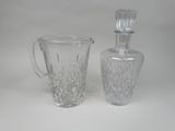 pair of cut glass decanters and a decanter