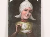 an old poster of a woman holding a cup of coffee