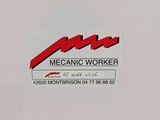 a sign that says mechanic worker on the side of a refrigerator