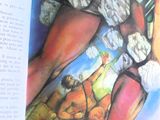 une personne tenant un livre ouvert à la page où figure l'image d'une femme