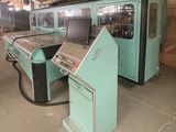 two machines that are sitting in a building