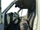 the interior of a truck with the driver ' s seat up