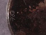 a close up of a bowl of food on a table