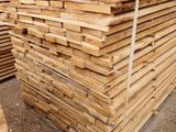a pile of lumber stacked on top of each other