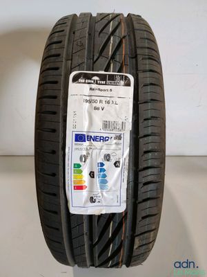 a close up of a tire on a white surface