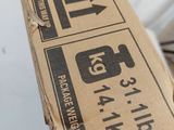 a box with a sign on it sitting on a table