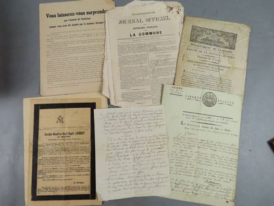 some old papers are sitting on top of a table