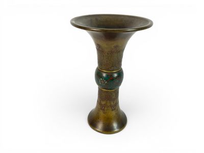 an image of a bronze vase on a white background