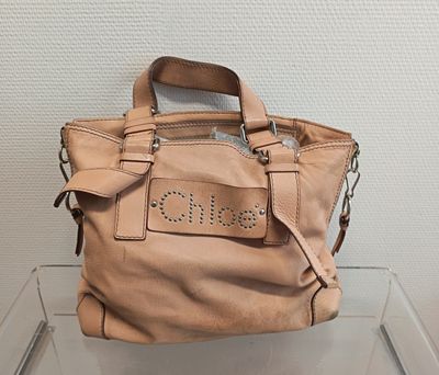 Sac à main en cuir Michael Korsh avec logo clouté sur le devant